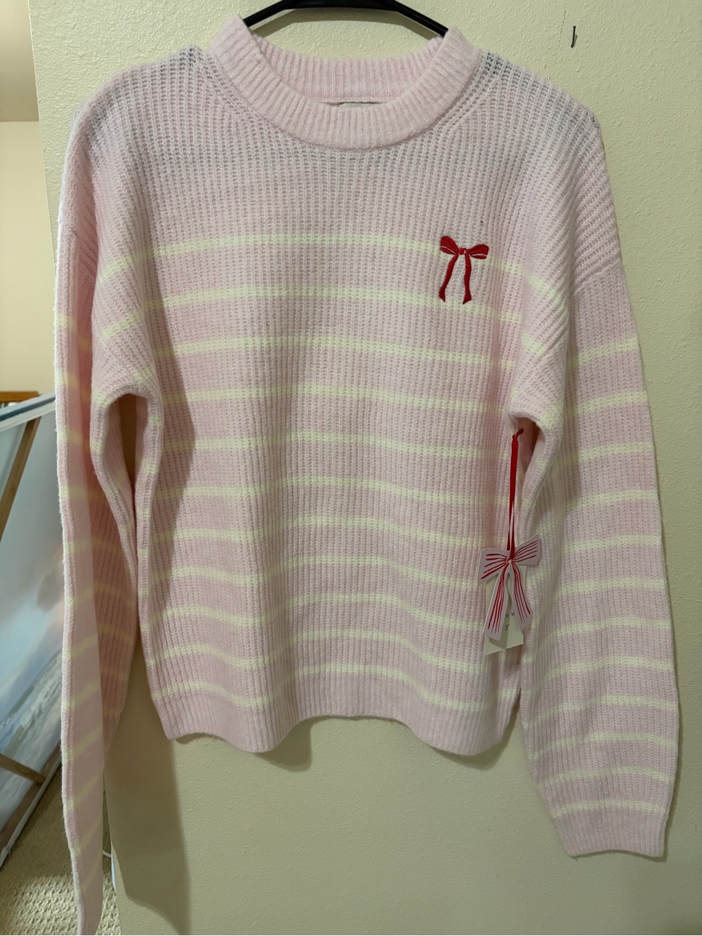 a new day Pink & Cream Striped Crewneck Sweater with red bow.